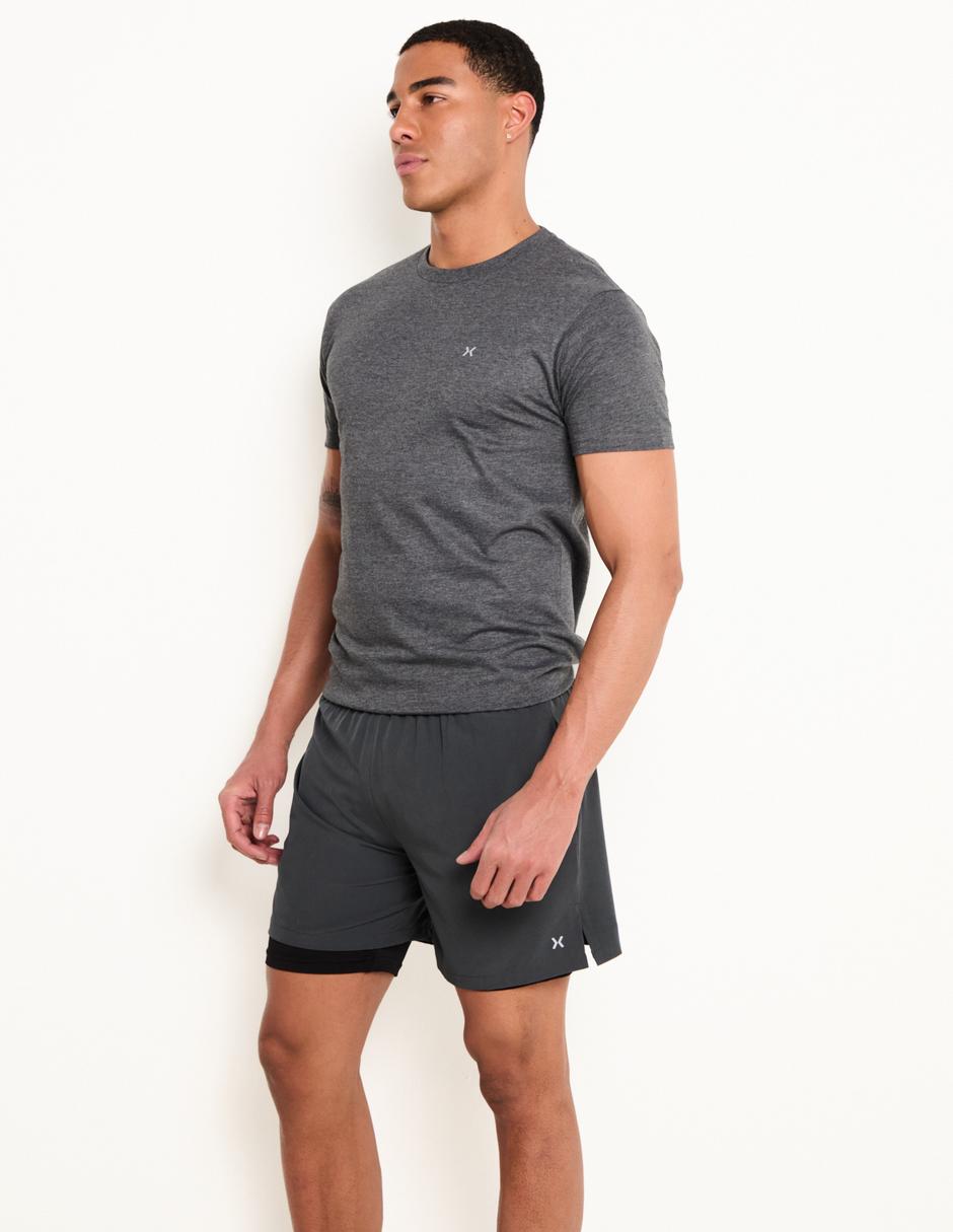 Short efecto doble prenda para correr hombre