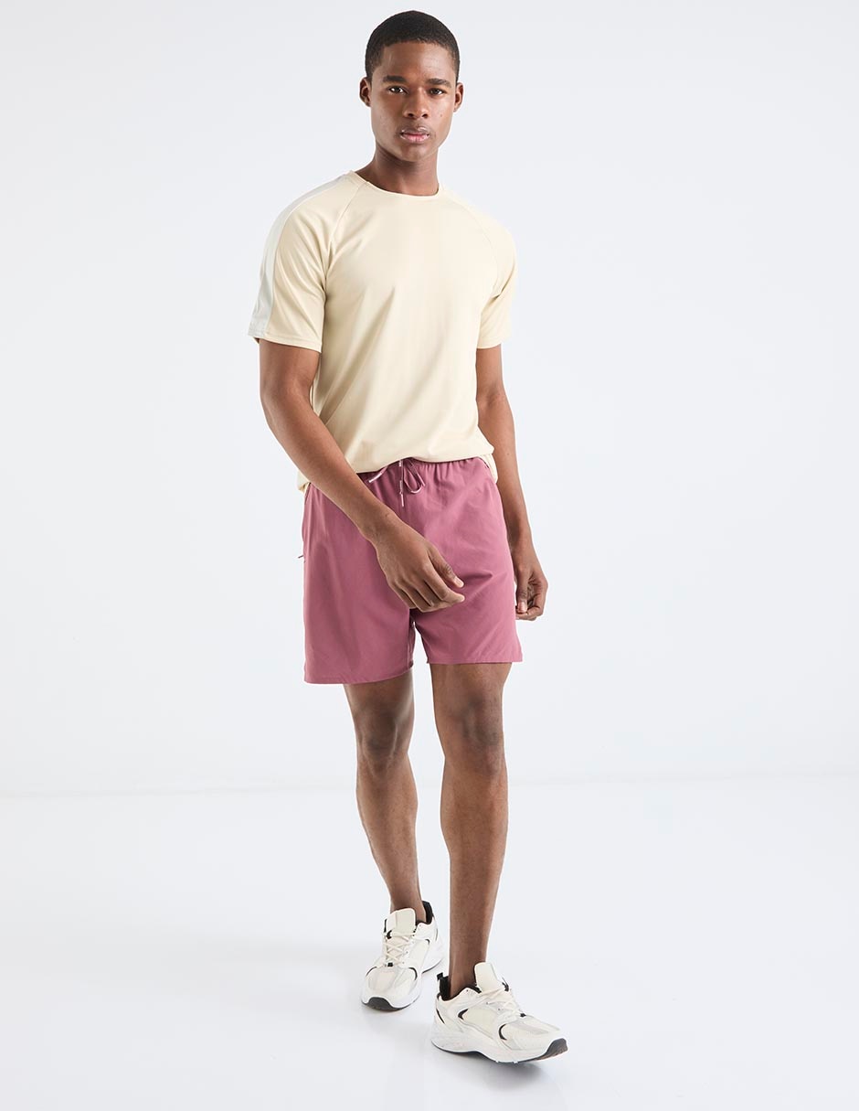 Short con bolsillos Shkout Core 7 para correr hombre 3